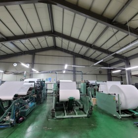 미용티슈 권취기